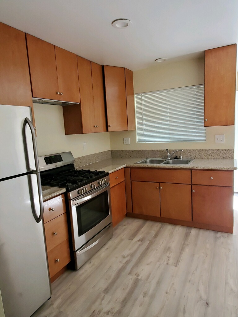 Full kitchen remodel with new cabinetry, counters, and appliances completed in La Mesa